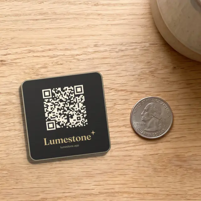 The Lumestone plaque next to a US quarter for size